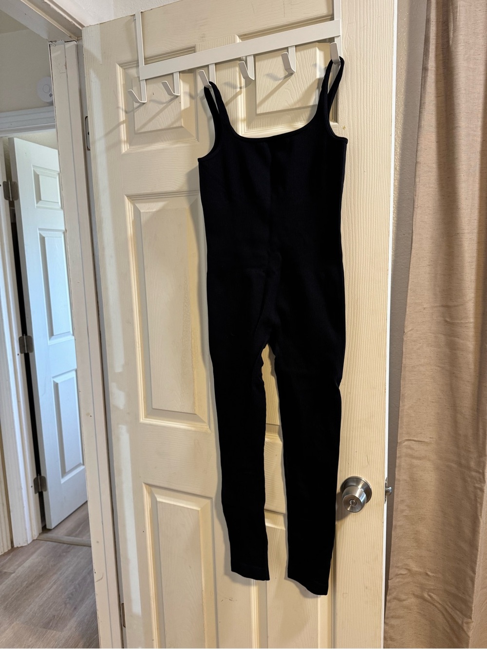 Amazon Black Sleeveless Jumpsuit with Slim Legs
